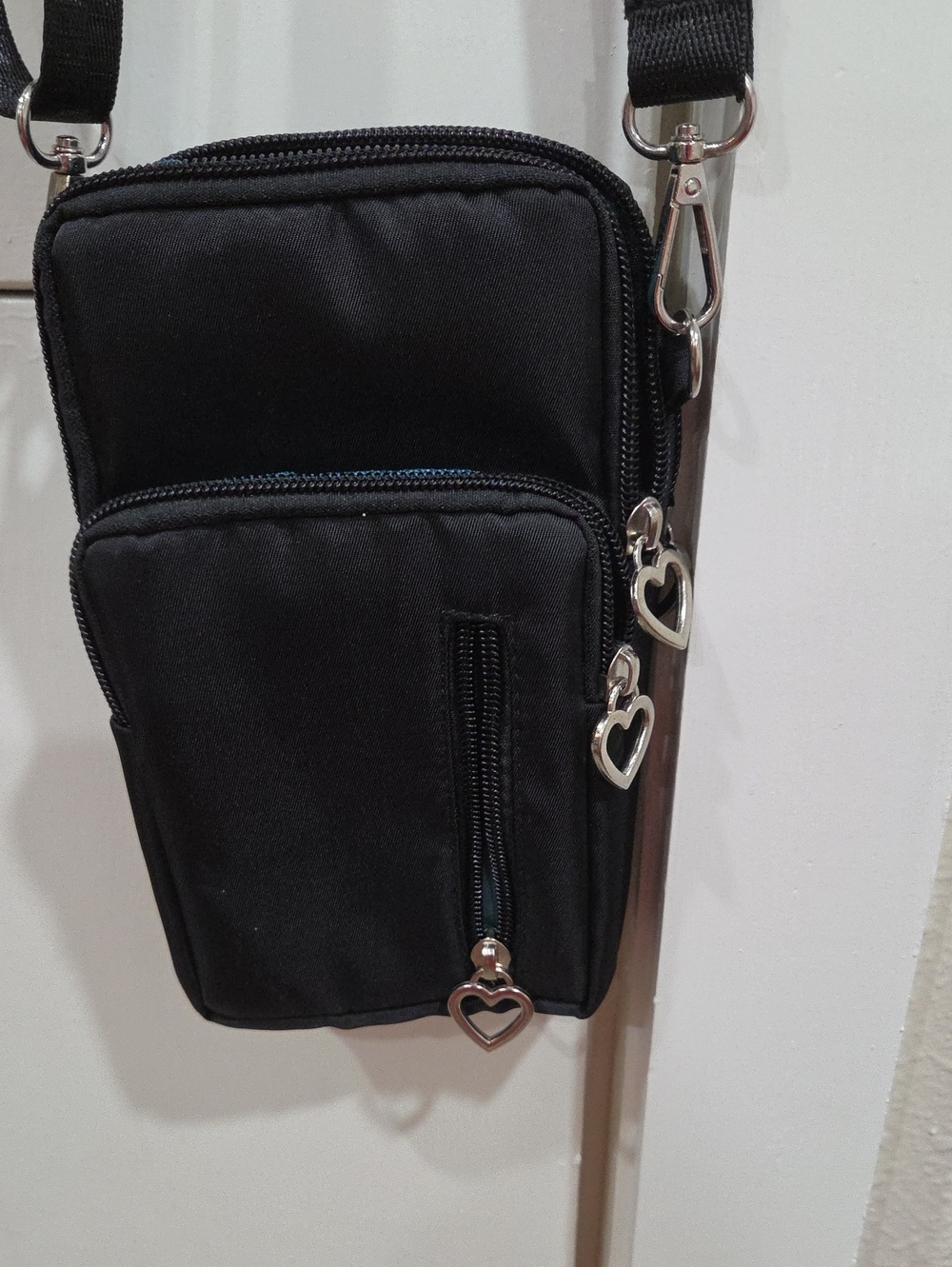 Black Crossbody Phone Bag with Heart Zippers